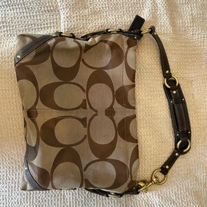 Older authentic Coach purse. Inside is very clean.